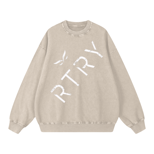 Beige sweatshirt with 'RTRY' text on a white background