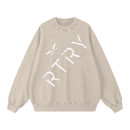 Beige sweatshirt with 'RTRY' text on a white background